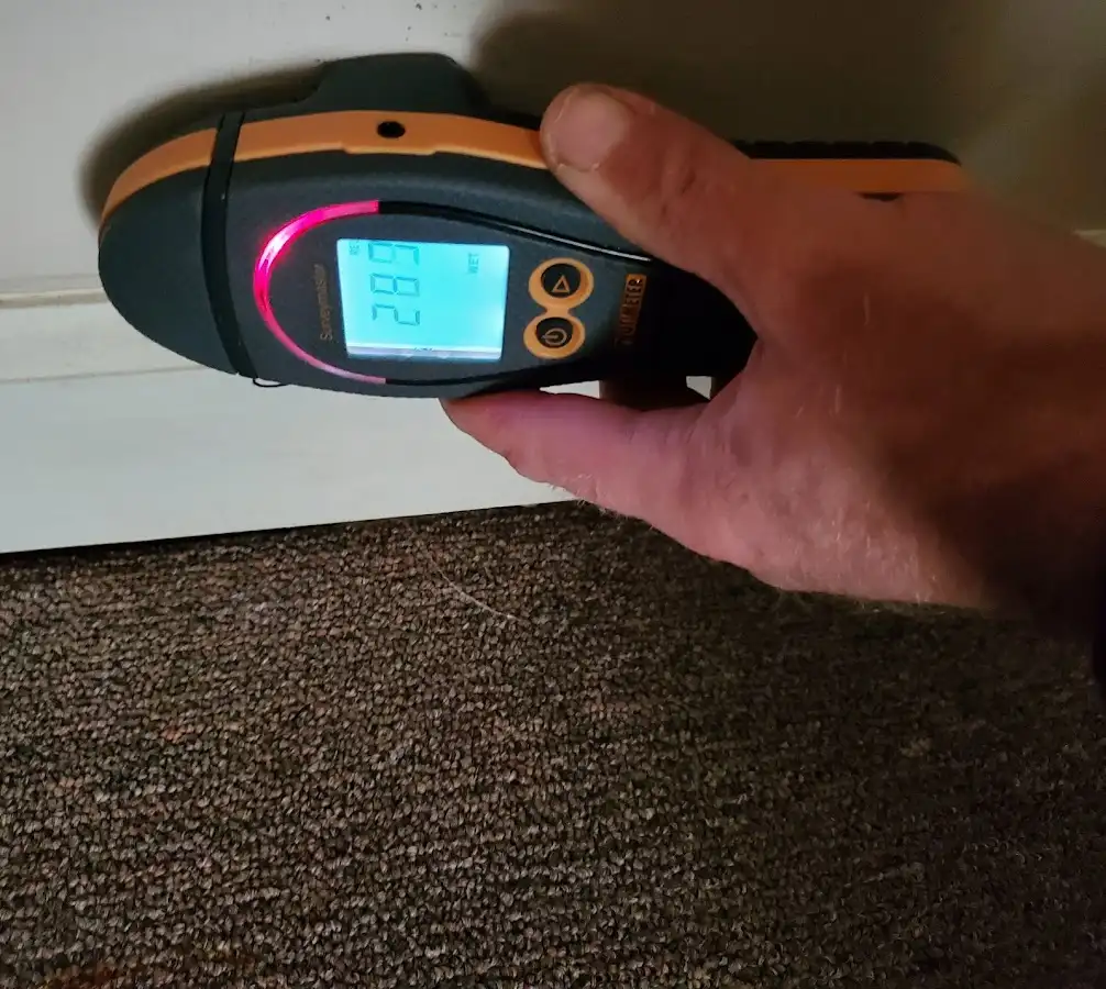 Moisture detection at baseboard during Storm Damage Restoration in Alum Rock